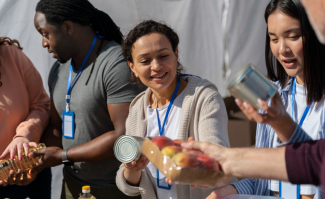 volunteers working at a food drive